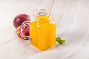 Vitamin beverage - peach juice glass