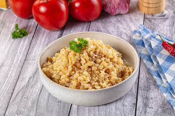 Vegan cuisine - boiled bulgur garnish