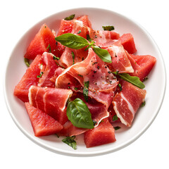 Fresh watermelon salad with prosciutto and basil in a white bowl on a transparent background Concept of healthy eating, summer appetizer, and gourmet cuisine