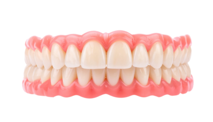 Full set of dentures, front view, isolated on white background