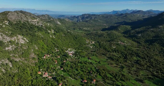 Village near Lovcen National Park, Dense forested landscape, Panoramic view, Drone shot