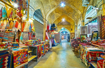 The alleyway with carpet stalls in Vakil Bazaar, Shiraz, Iran