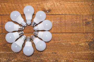 LED lamps lie on the table in a circle