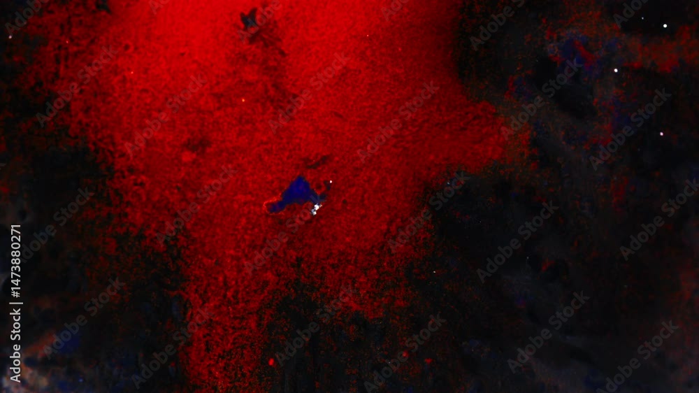 Poster Red ink floating in a dark space, creating an abstract and surreal atmosphere