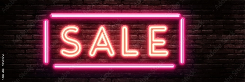 Aufkleber neon sale sign glowing bright against a dark brick wall with empty space on the right side adding em