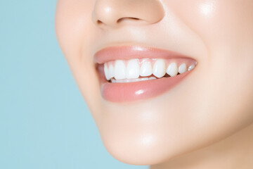 Obraz premium Woman showing healthy teeth and gums smiling on blue background