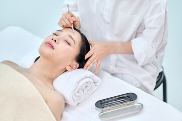 Female Facial Extraction Treatment by Professional Esthetician at Spa