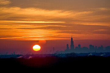 Naklejka premium Ciryscape of Chicago downtown on sunset. Colored sky