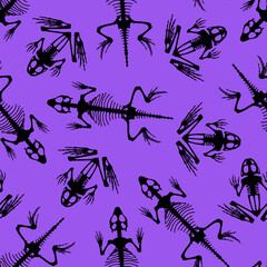 Seamless pattern. Skeletal system of animals. Black frog and lizard bone structure isolated on a violet background. Amphibian and reptiles silhouettes.
