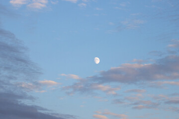 minimalist evening sky with moon and clouds