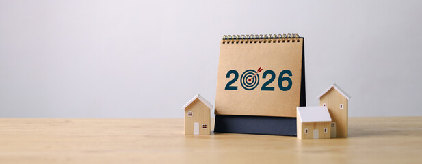 Goal Setting in 2026,  Businessman Touching Progress Bar from 2025 to 2026, New Business Startup,...