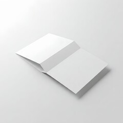 An open white brochure or folder lying flat on a light background, showcasing its blank interior and clean design.