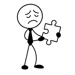 Disappointed businessman holding puzzle piece