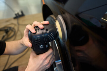 A Detailed Close Up of the Car Polishing Process in the Field of Automotive Detailing