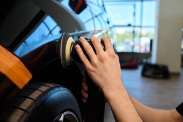 A Detailed Close Up of the Car Polishing Process in the Field of Automotive Detailing
