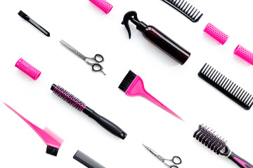 Obraz premium Pattern flat lay of hairdresser and barber tools and accessories on white background, top view