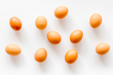 Background of chicken eggs, top view. Food pattern. Easter background