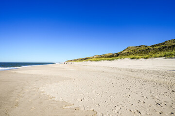 Landscape on the beach between Wenningstedt and Kampen on the Frisian island of Sylt. View of the North Sea and the surrounding nature.
