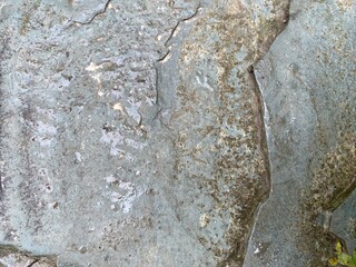 Smooth Wet Grey Stone Surface with Subtle Texture and Natural Markings