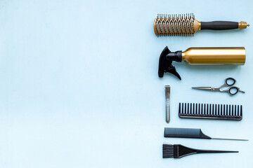 Layout of hairdresser tools set, top view. Combs and scissors on white background