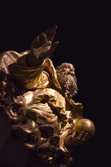 Gilded Sculpture of God Holding Globe in Darkness