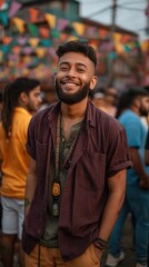Naklejka premium Happy South Asian young man smiling at festival