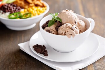 Chipotle spicy chicken lunch bowl with rice corn, beans, rice and jalapenos