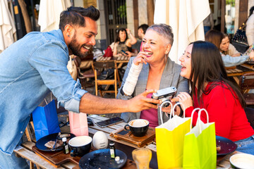 Friends sharing memories and laughter at outdoor cafe