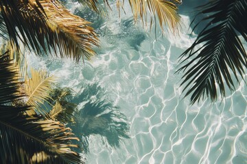 Tropical foliage above a tranquil pool's surface.