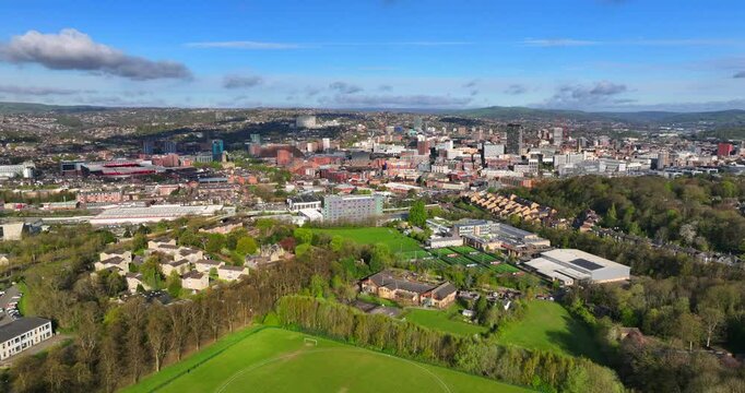 Aerial video of Sheffield skyline from the vantage point of Norfolk heritage park on a Spring day