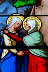 Stained glass (19th century) of Visitation of the Virgin Mary to her pregnant cousin Elizabeth.