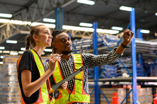 warehouse worker brainstorms checklist product to shelf in warehouse store. industry logistic export import distribution concept. - Powered by Adobe