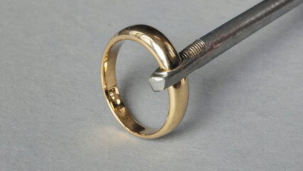 Gold ring being resized