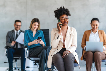 Obraz premium Happy young African American business woman in startup office. Business success black woman.
