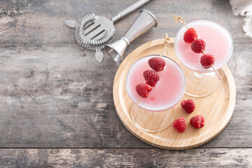 Elegant French Martini Cocktail on wooden table. Top view. Copy space