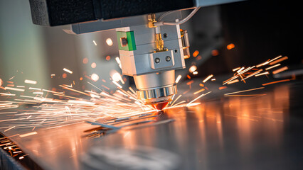 CNC Laser cutting of metal, modern industrial technology.