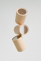 eco-freindly cylindrical paper packaging with clear window, brown craft paper gift box with window display, luxury corrugated paperboard packaging, small size kraft paper bottle tube mockup