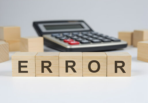 Error calculator blocks wooden cubes mistake problem failure incorrect calculation accounting wrong