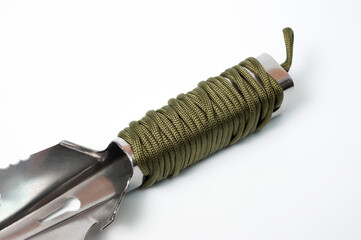 Metal tourist shovel, multitool with a comfortable handle.