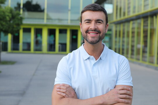 Confident Smiling Young Professional Standing Outside Modern Building