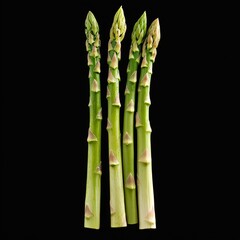 Five Vivid Green Asparagus Stalks, Isolated on Black Background, Perfect for Food Photography