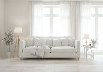 Bright living room interior with white sofa, table, lamp, and potted plant