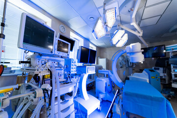 Surgical room with advanced tech. High-tech medical devices illuminate a modern surgical room, ready for procedures and patient care.