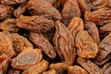 Raisins on a white background. Dried grapes.	