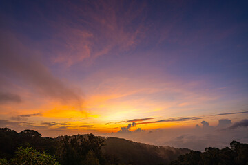 scenery sweet sky at twilight above The hills in the foreground add depth and contrast to the misty valleys in the distance. atmospheric scene that beautifully  majesty of nature.