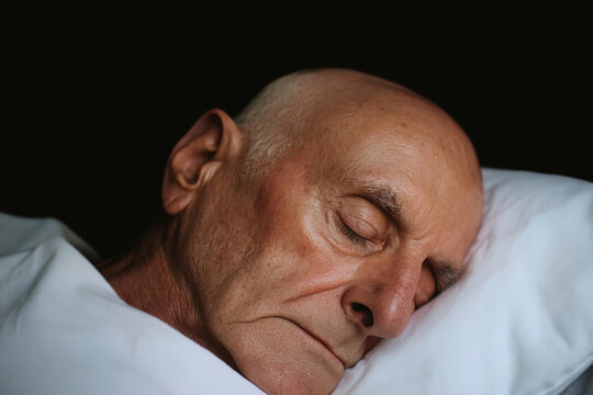 Elderly Man Resting Peacefully During Illness Recovery