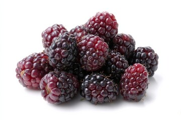 A pile of ripe, dark-colored blackberries.