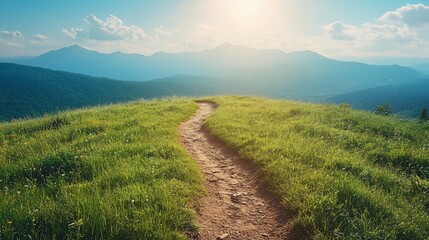 Fototapeta premium Scenic mountain path leading to distant peaks under a vibrant sky