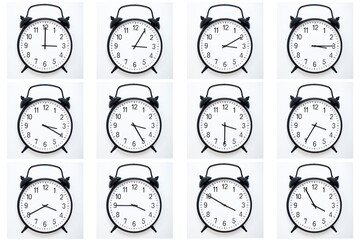 A set of 12 Black Vintage Alarm Clocks showing time from 03:00 to 03:55 or 15:00 to 15:55. Isolated...