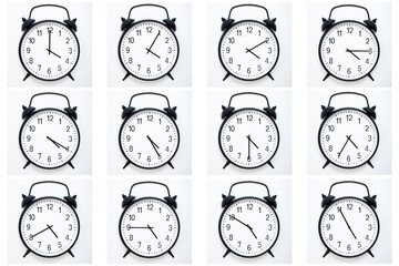A set of 12 Black Vintage Alarm Clocks showing time from 04:00 to 04:55 or 16:00 to 16:55. Isolated...